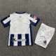 REAL SOC. Primera Equipación 2026-2027, conjunto completo niños